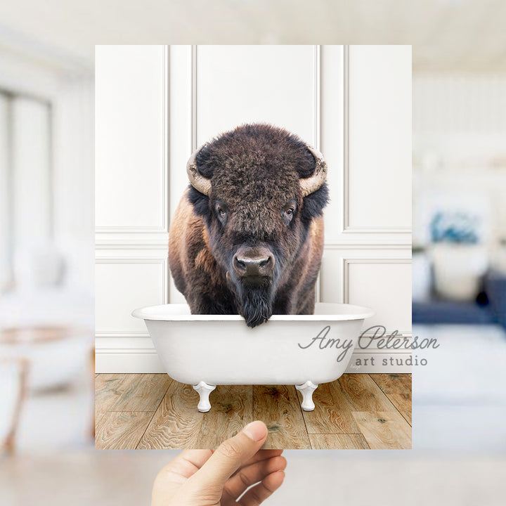 a bison is standing in a bath tub