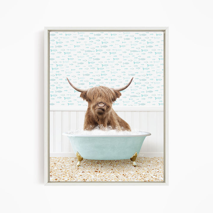 A brown cow with long horns is sitting in a light blue bathtub filled with water, surrounded by a pattern of small fish.