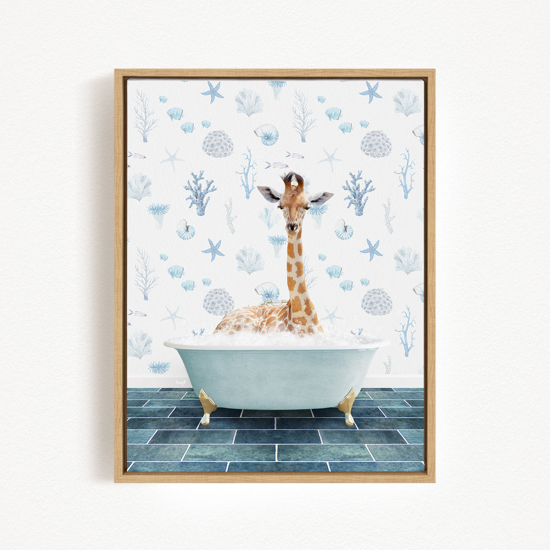 A giraffe sitting in a bathtub filled with bubbles, surrounded by a blue and white ocean-themed wallpaper.