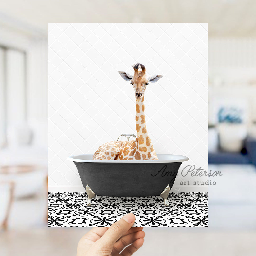 a giraffe is sitting in a bath tub