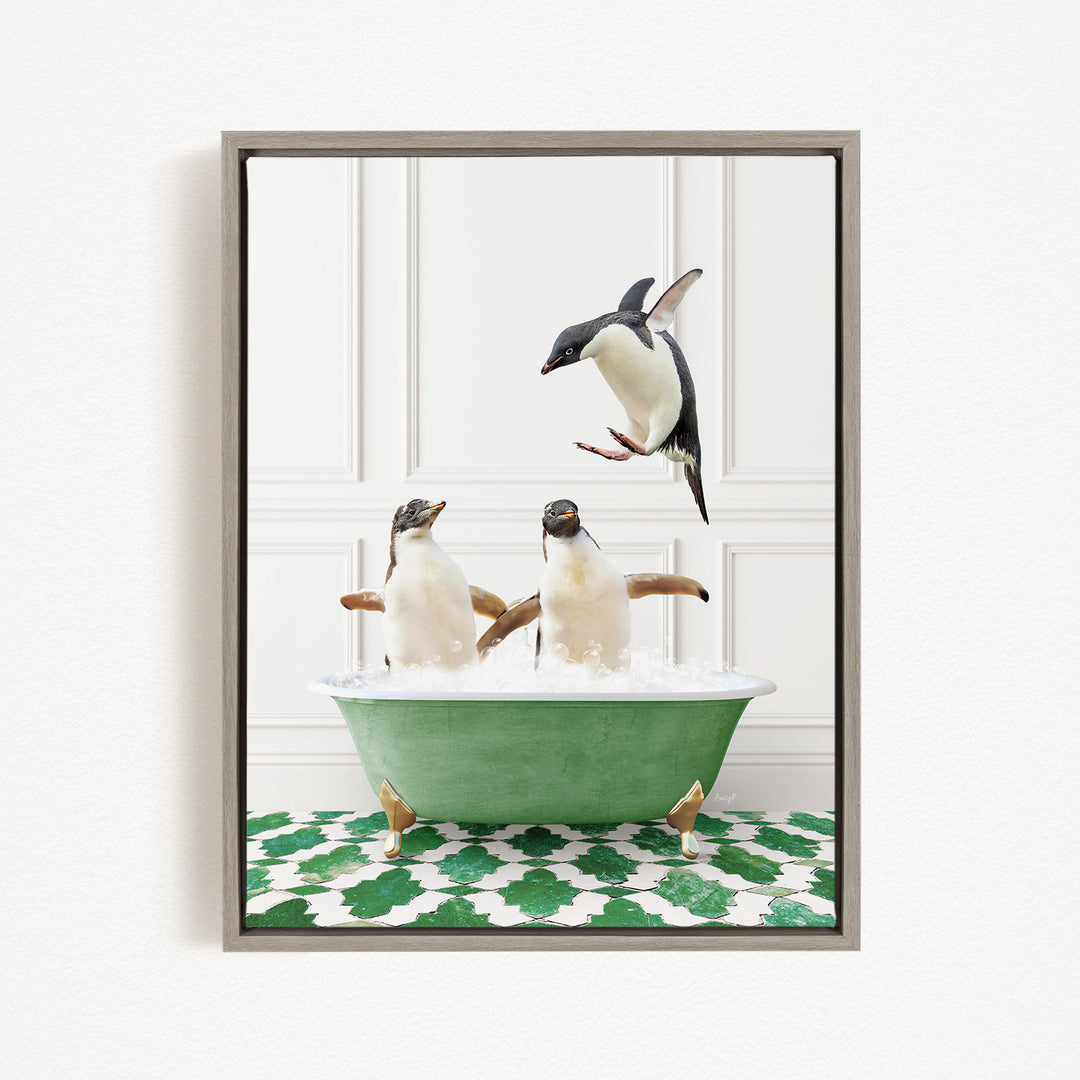 A framed image depicting three penguins in a green bathtub, with one penguin flying above the tub.