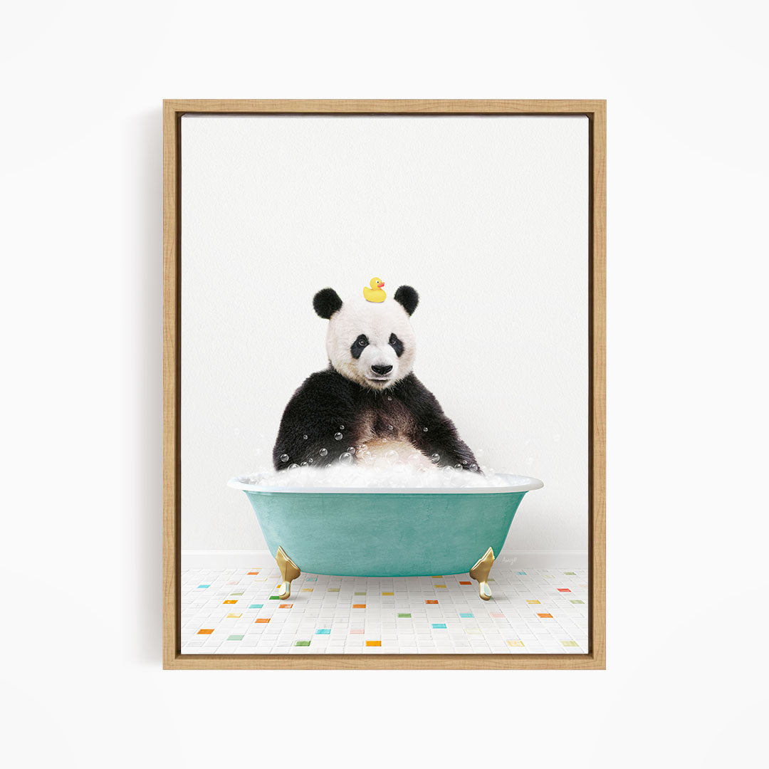 A panda bear sitting in a bathtub filled with bubbles, with a rubber duck floating on its head.