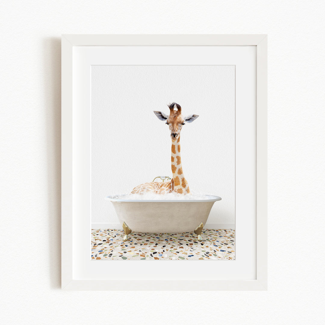 A giraffe is sitting in a white bathtub filled with water, creating a whimsical and playful scene.