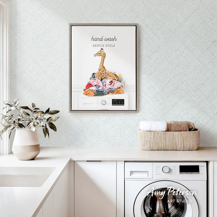 a hand-wash cycle, a giraffe, and a basket of towels, all set against a white and gray patterned wall.