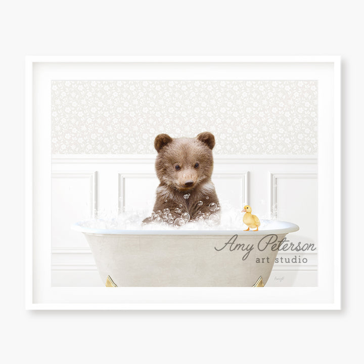 a brown teddy bear sitting in a bath tub