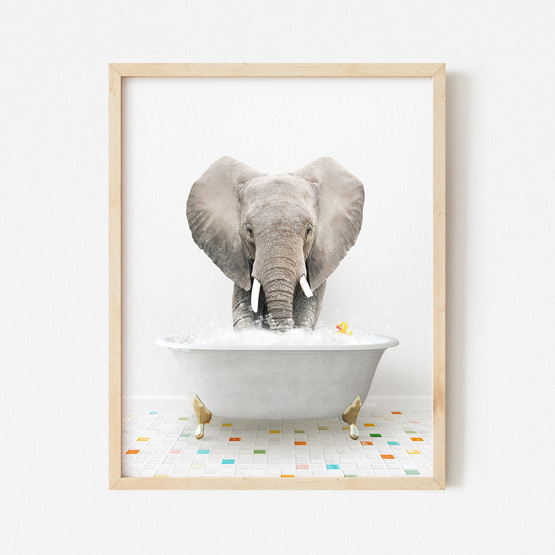 an elephant taking a bath in a bathtub