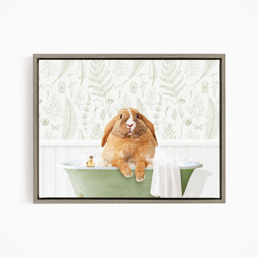 A brown rabbit sitting in a green bathtub filled with water, surrounded by a white wall with a green floral pattern.