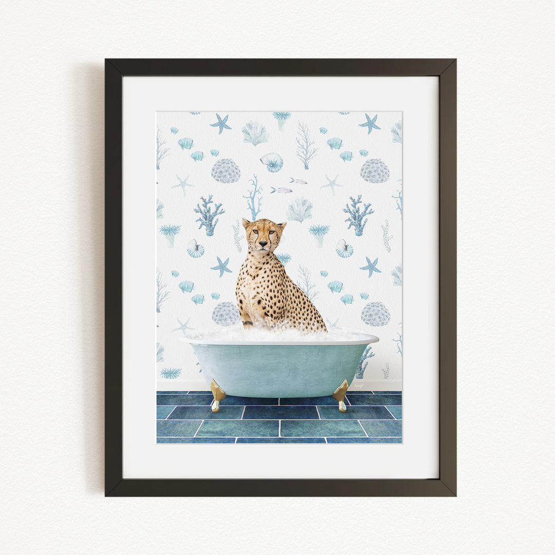 A cheetah sitting in a bathtub filled with water, surrounded by a blue and white ocean-themed wallpaper.