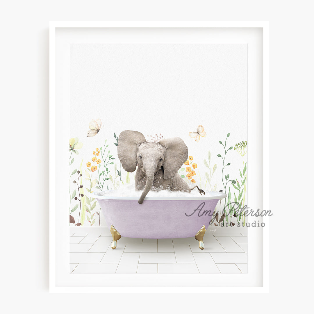 a picture of an elephant taking a bath