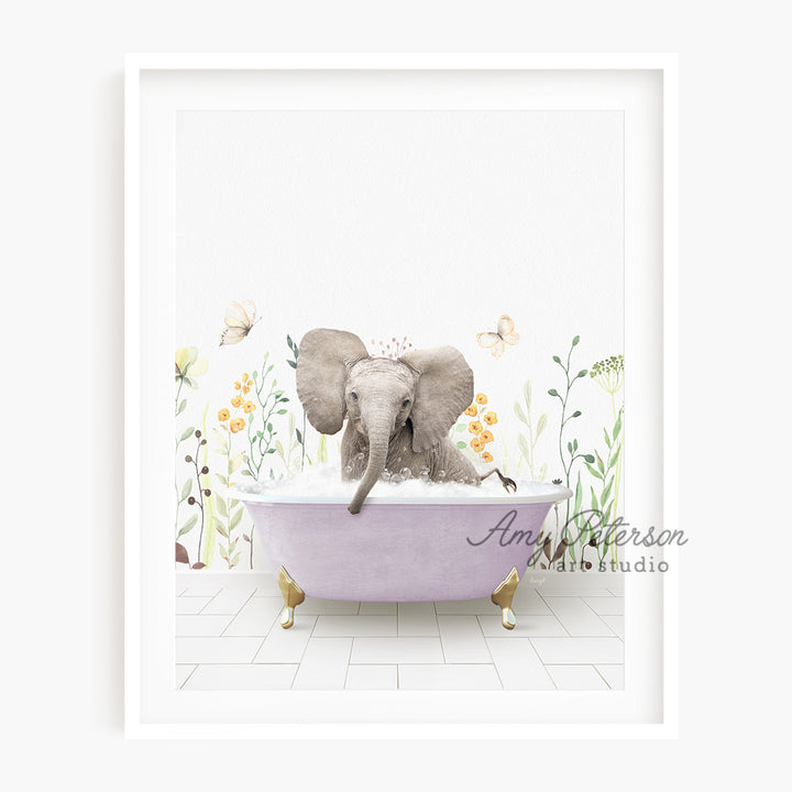 a picture of an elephant taking a bath