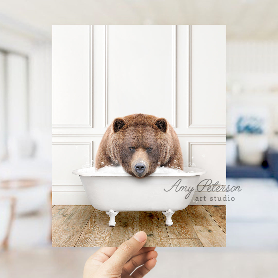 a brown bear sitting in a bath tub