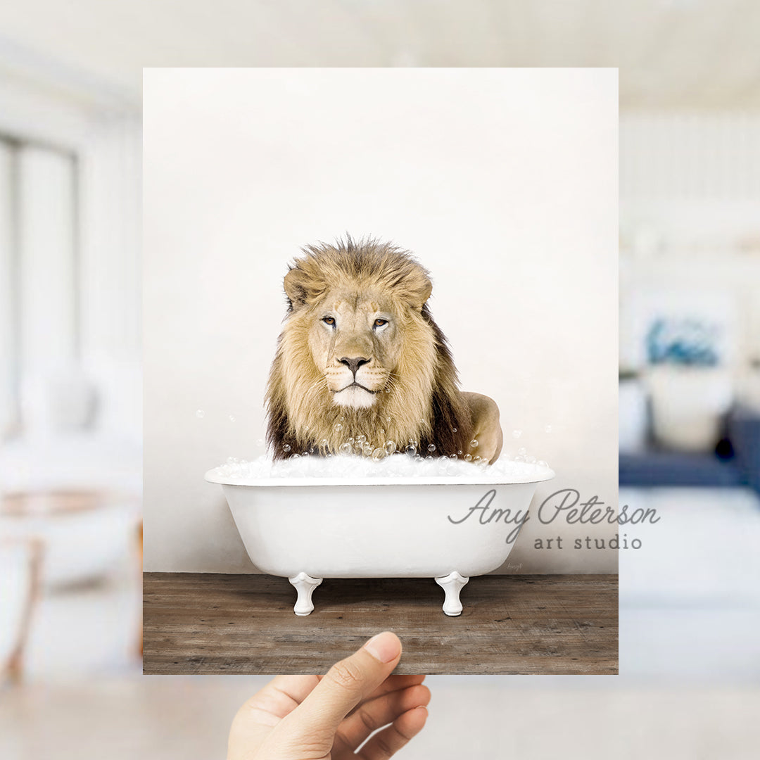 a lion sitting in a bathtub with his head in the bathtub