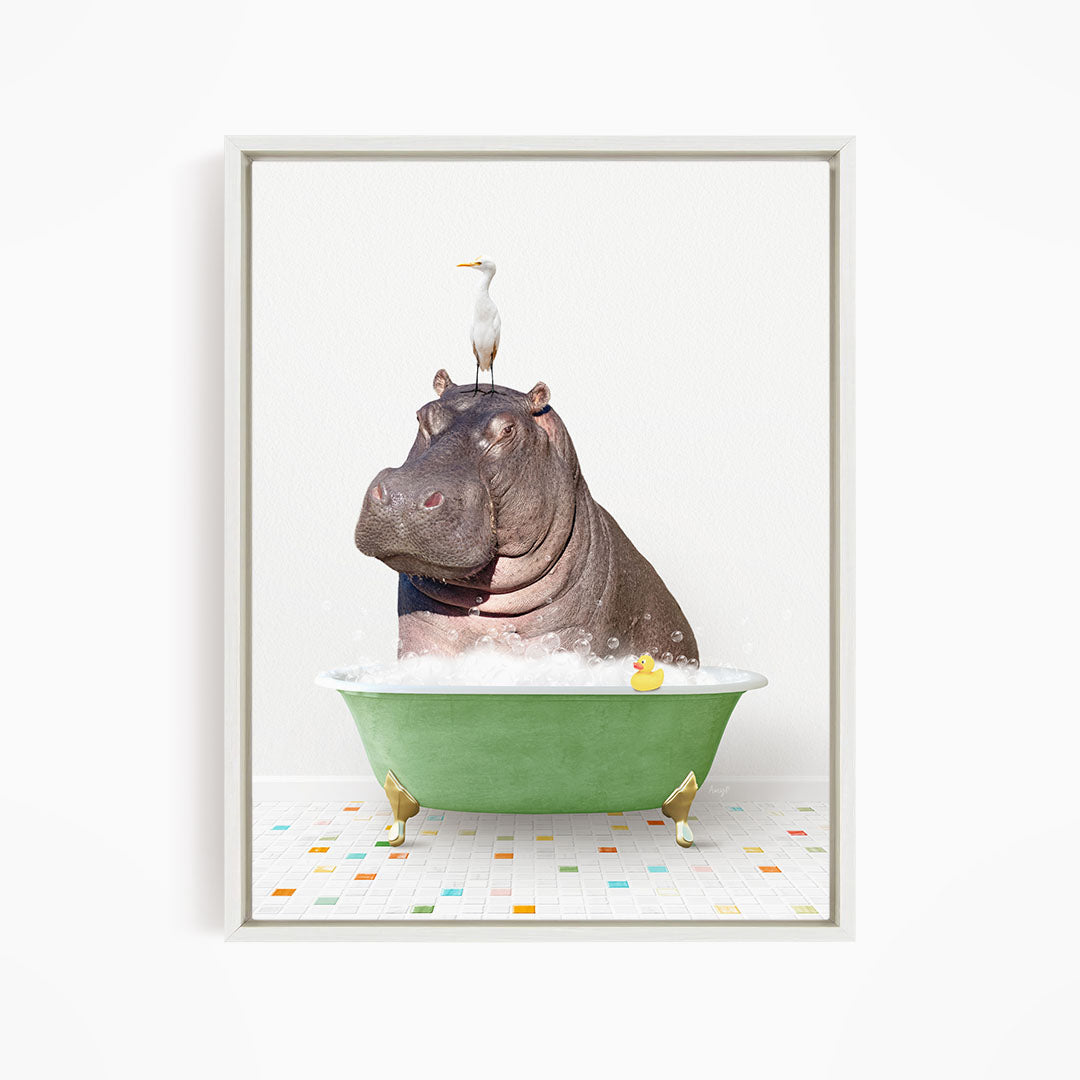 A large hippopotamus is sitting in a green bathtub, with a bird perched on its head.