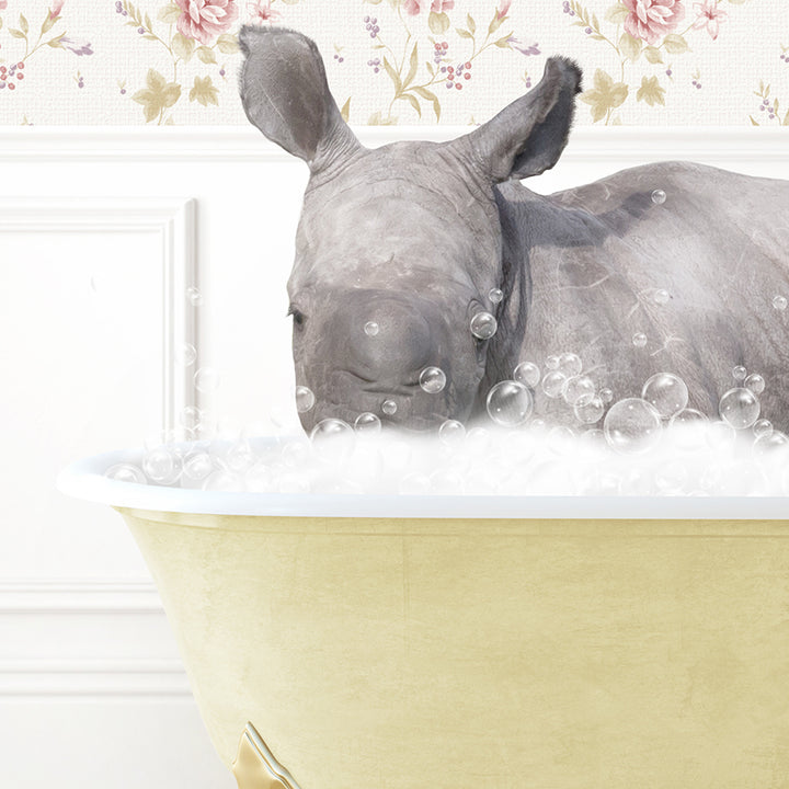 a rhino is taking a bath in a bathtub