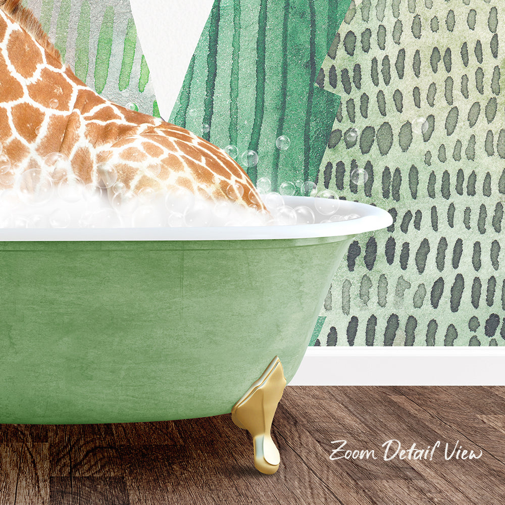 A giraffe is sitting in a green bathtub filled with bubbles, with a patterned wall in the background.
