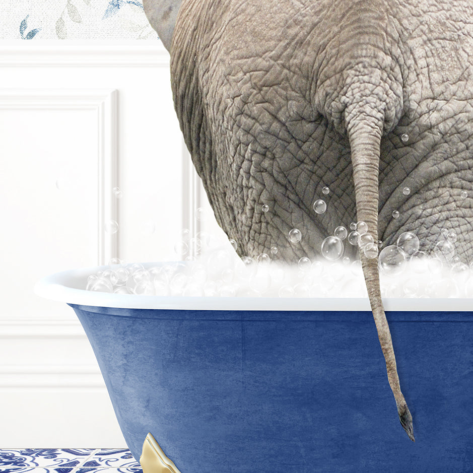 an elephant is taking a bath in a blue tub