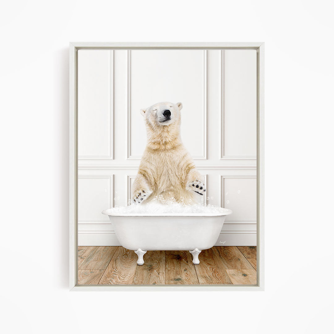 A polar bear standing in a white bathtub filled with water, appearing to enjoy the bath.