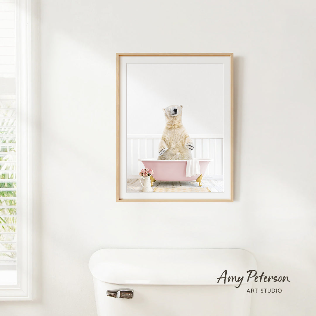 A polar bear sitting in a pink bathtub, surrounded by flowers, is the focus of the image.