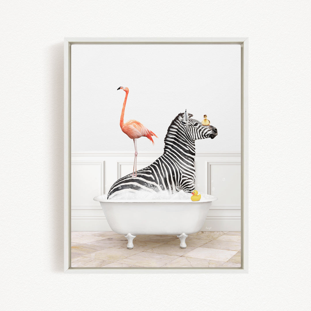 A zebra is sitting in a white bathtub, surrounded by a pink flamingo and a yellow rubber duck.