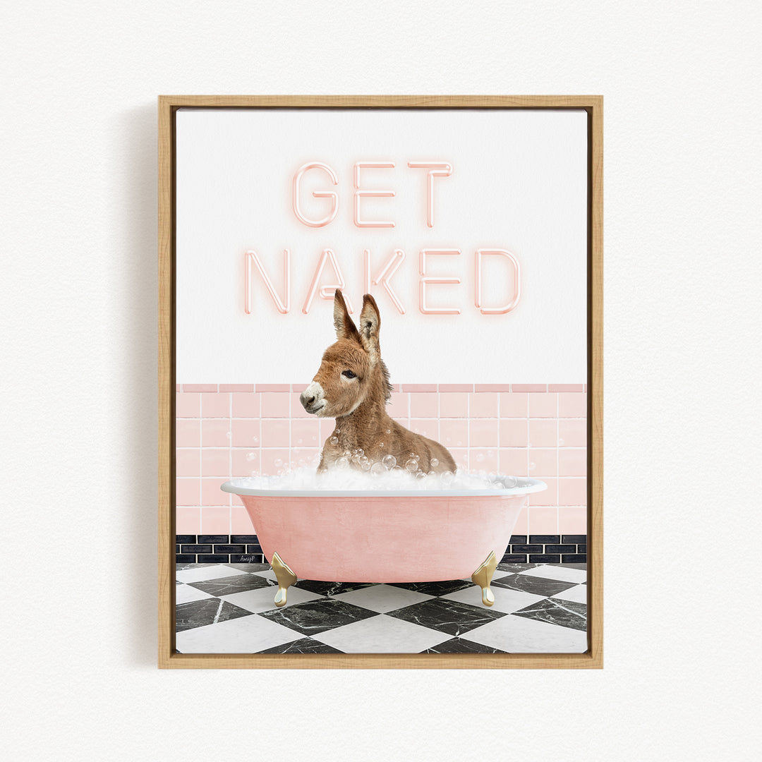 A donkey sitting in a pink bathtub with the text "GET NAKED" displayed above it.