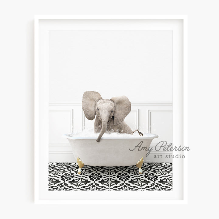 an elephant is taking a bath in a bathtub