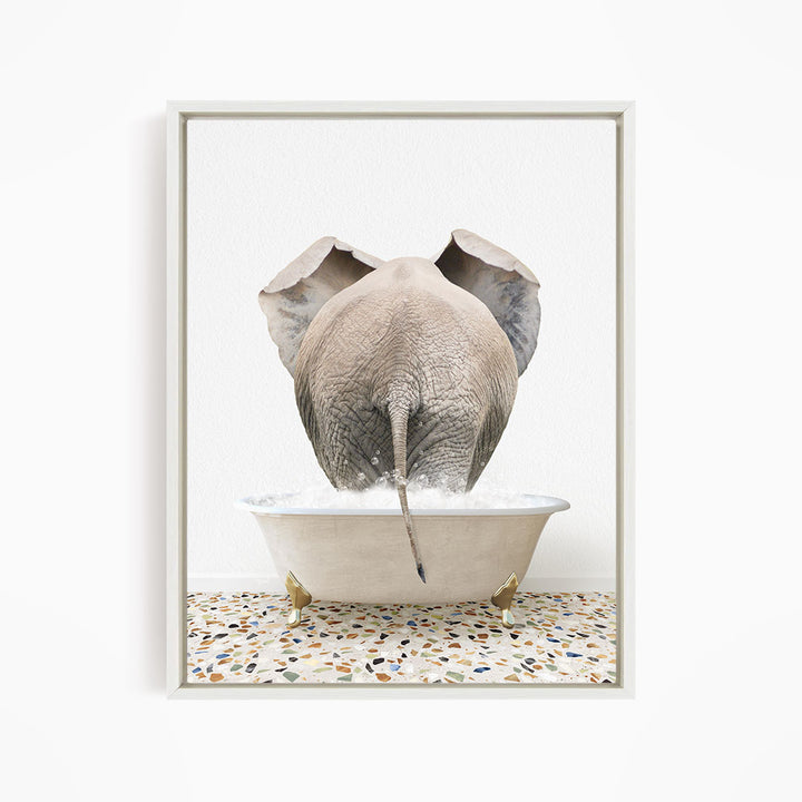 A large gray elephant is standing in a white bathtub filled with water, with its back turned to the viewer.