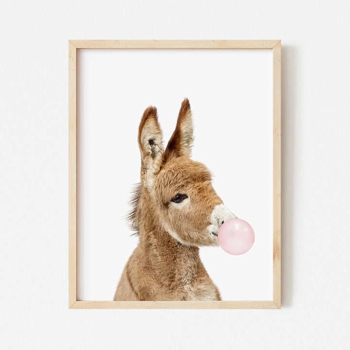 a picture of a donkey with a bubble in its mouth