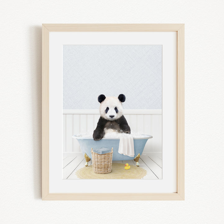 A panda bear sitting in a bathtub filled with bubbles, surrounded by rubber ducks and a basket.
