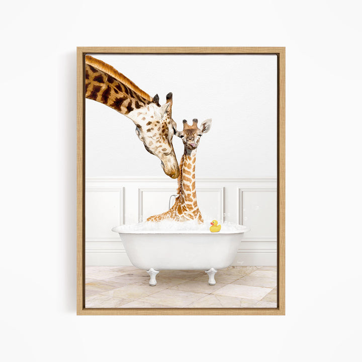 A mother giraffe and her baby giraffe are sitting together in a white bathtub, with a yellow rubber duck floating in the water.