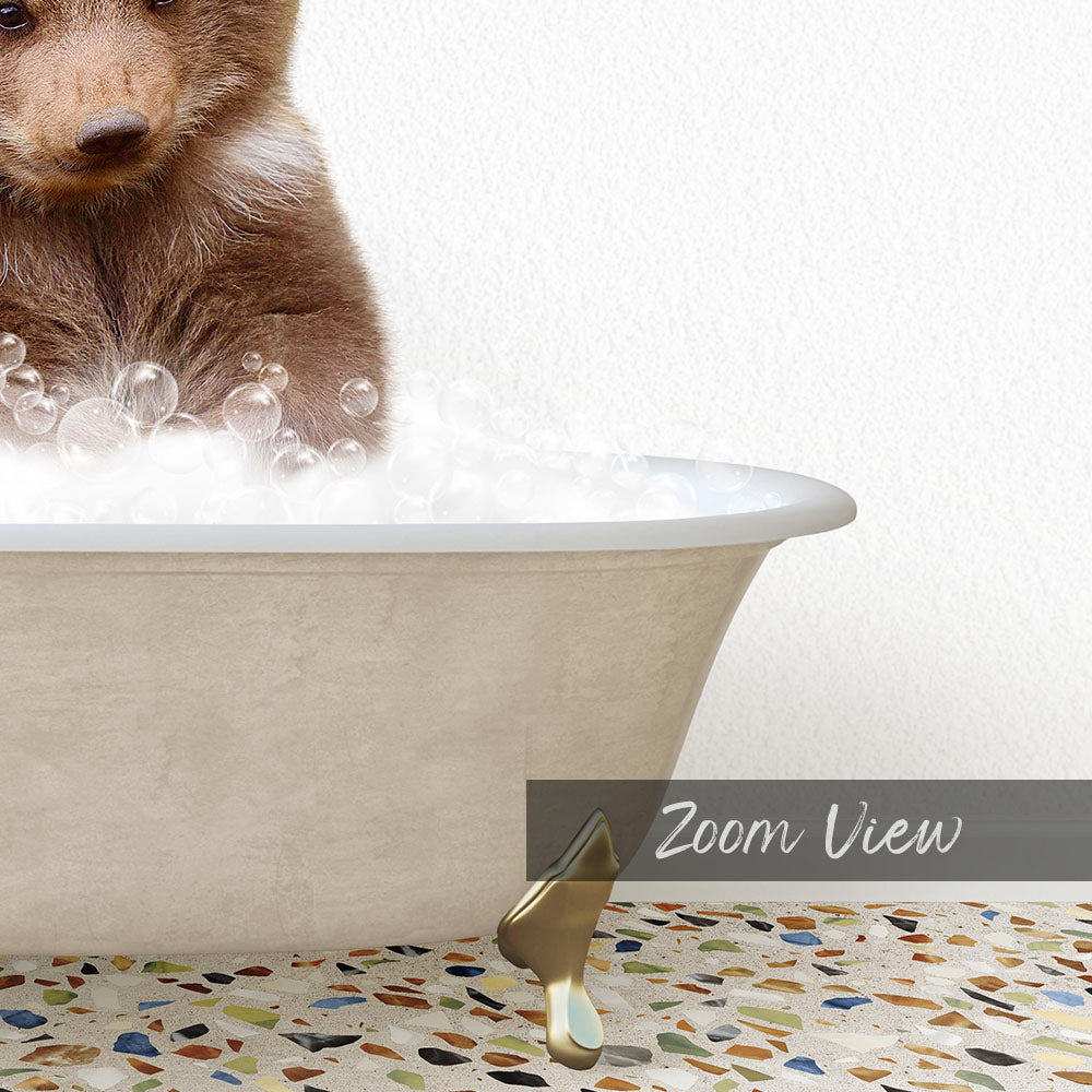 A cute brown bear is sitting in a bathtub filled with bubbles, creating a playful and whimsical scene.