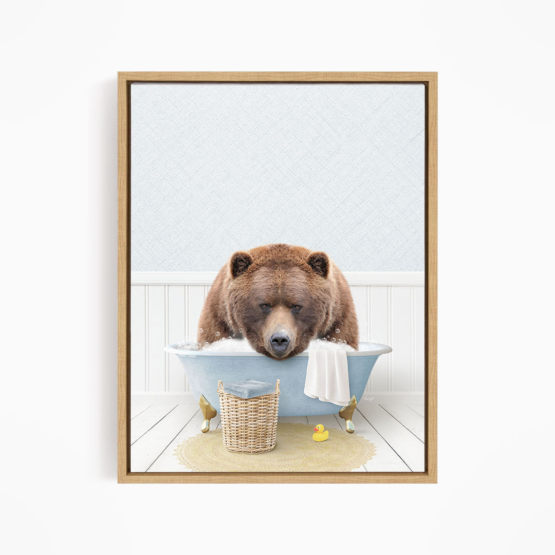 A brown bear is sitting in a blue bathtub filled with water, surrounded by rubber ducks and a basket.
