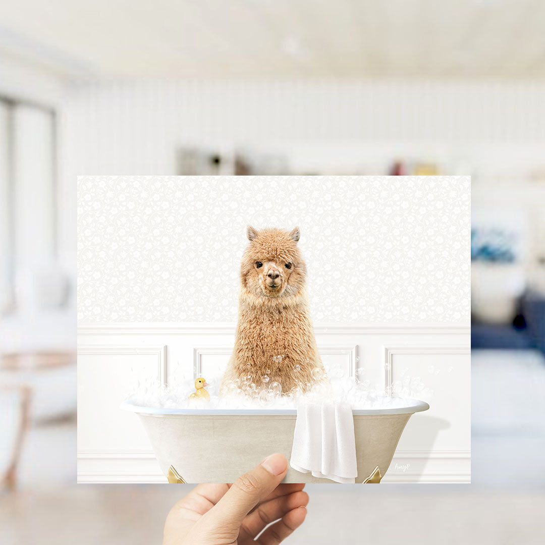 A fluffy brown dog sitting in a white bathtub filled with bubbles, with a yellow rubber duck floating nearby.
