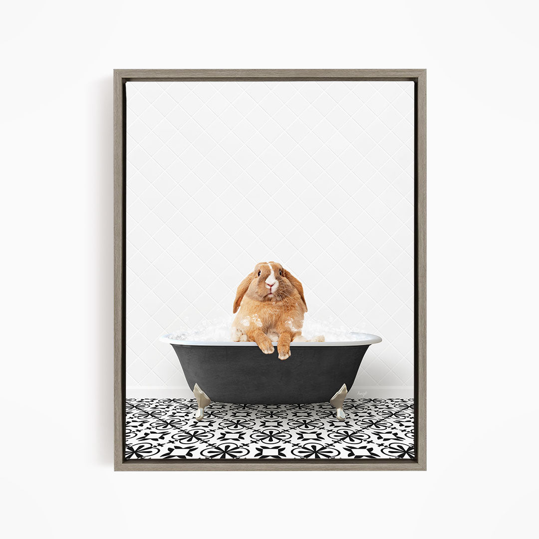 A brown rabbit sitting in a bathtub filled with water, surrounded by a black and white patterned floor.
