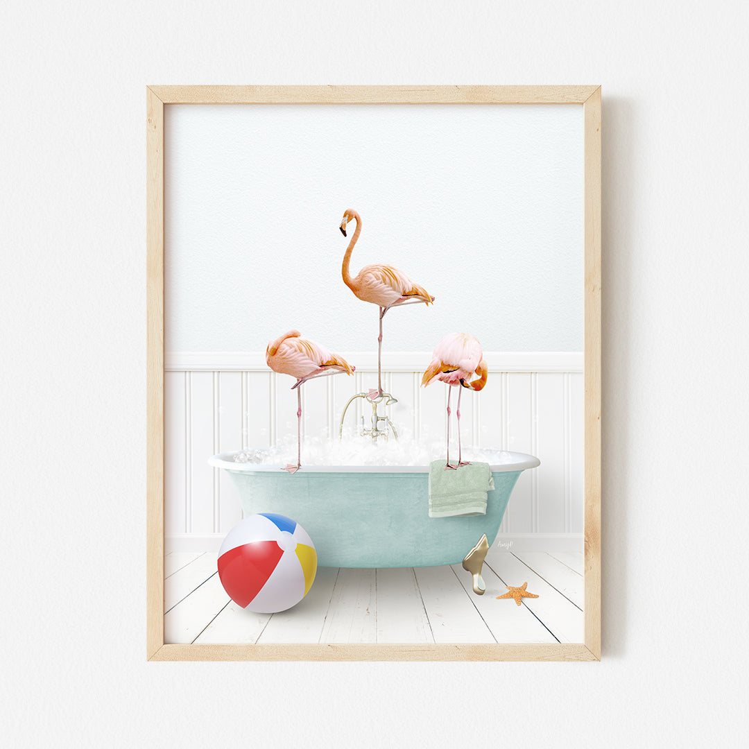 a group of flamingos in a bathtub with a beach ball