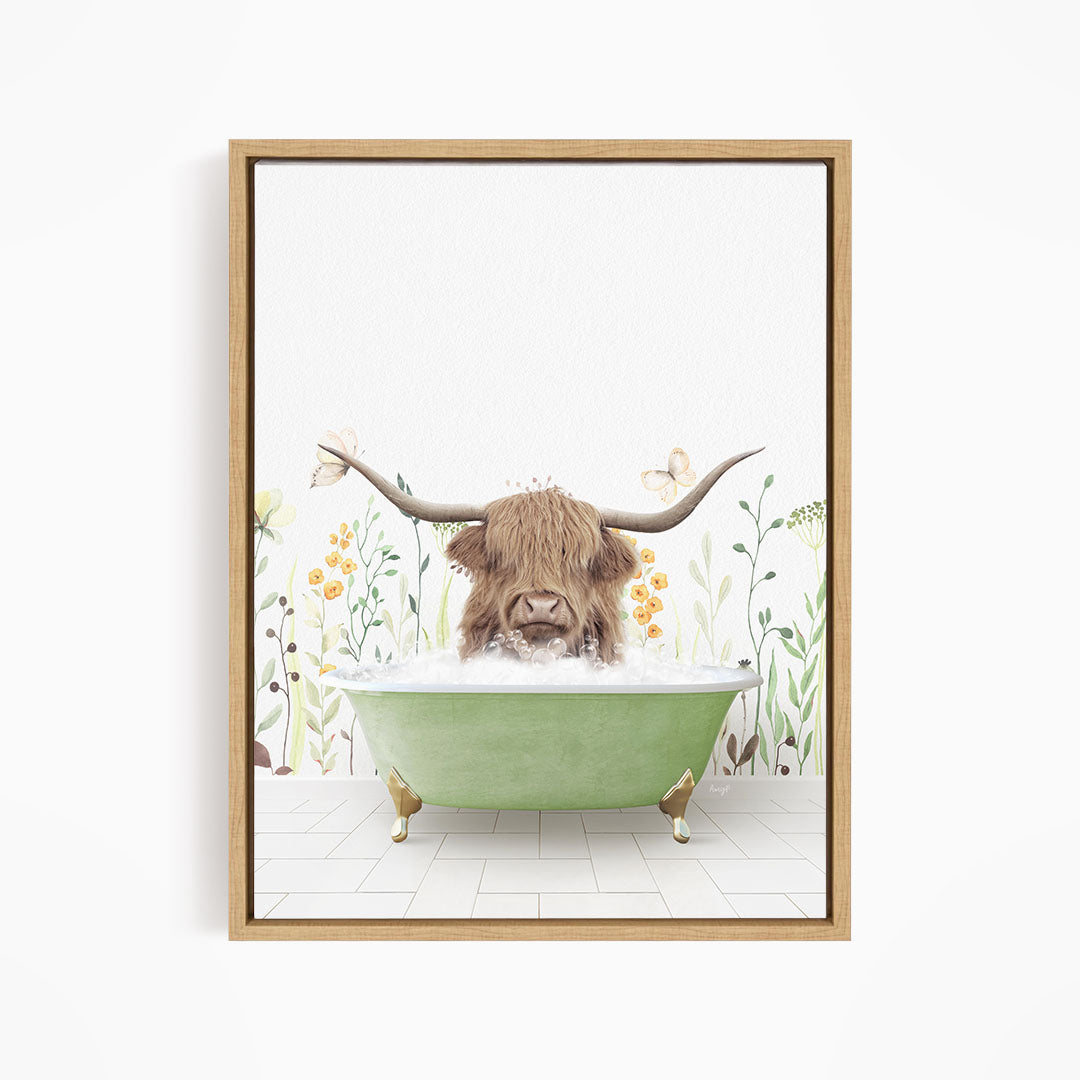 A brown cow with large horns is sitting in a green bathtub filled with water, surrounded by flowers and plants.