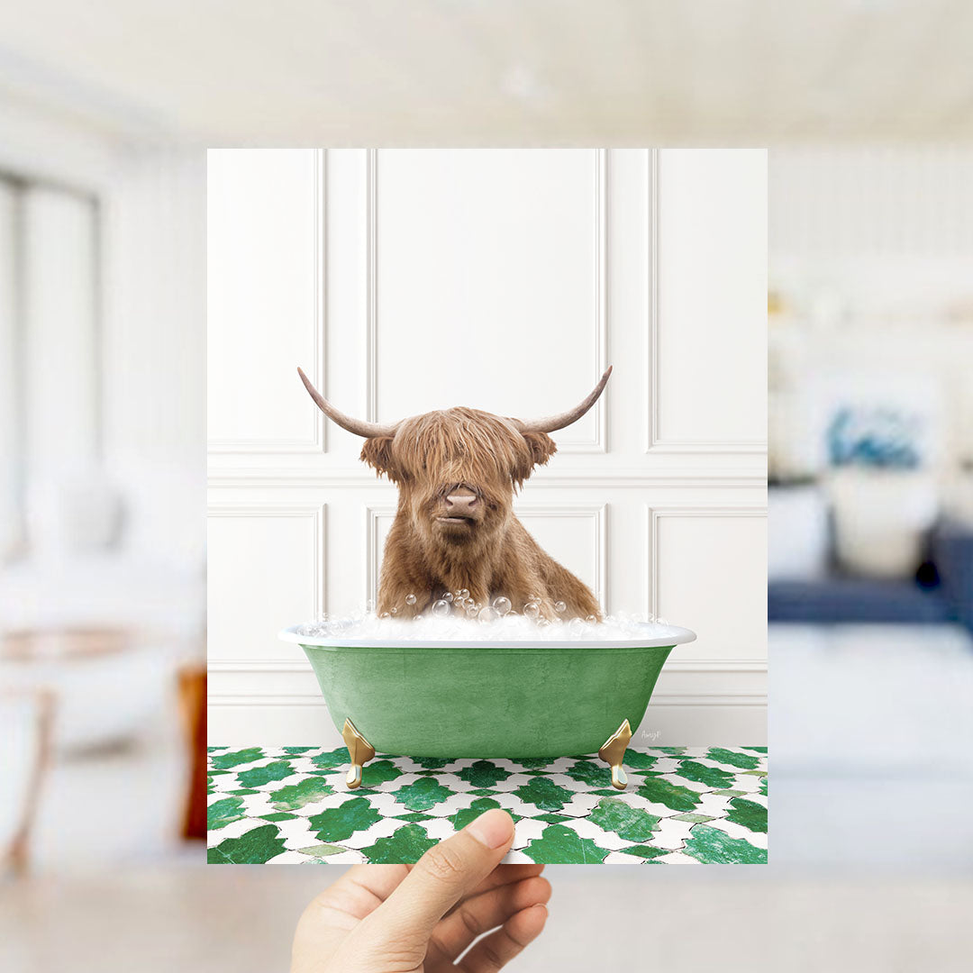 A brown cow with long horns is sitting in a green bathtub filled with bubbles, surrounded by a green and white patterned floor.