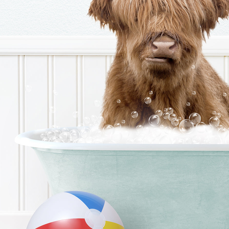 a dog sitting in a bathtub with bubbles