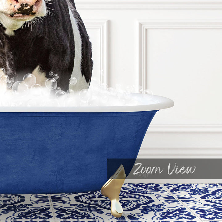 A black and white cow is standing in a blue bathtub filled with bubbles, with a white wall and a patterned tile floor in the background.