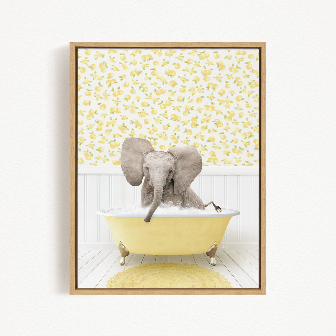 A gray elephant is sitting in a yellow bathtub filled with water, surrounded by a yellow floral pattern on the wall behind it.