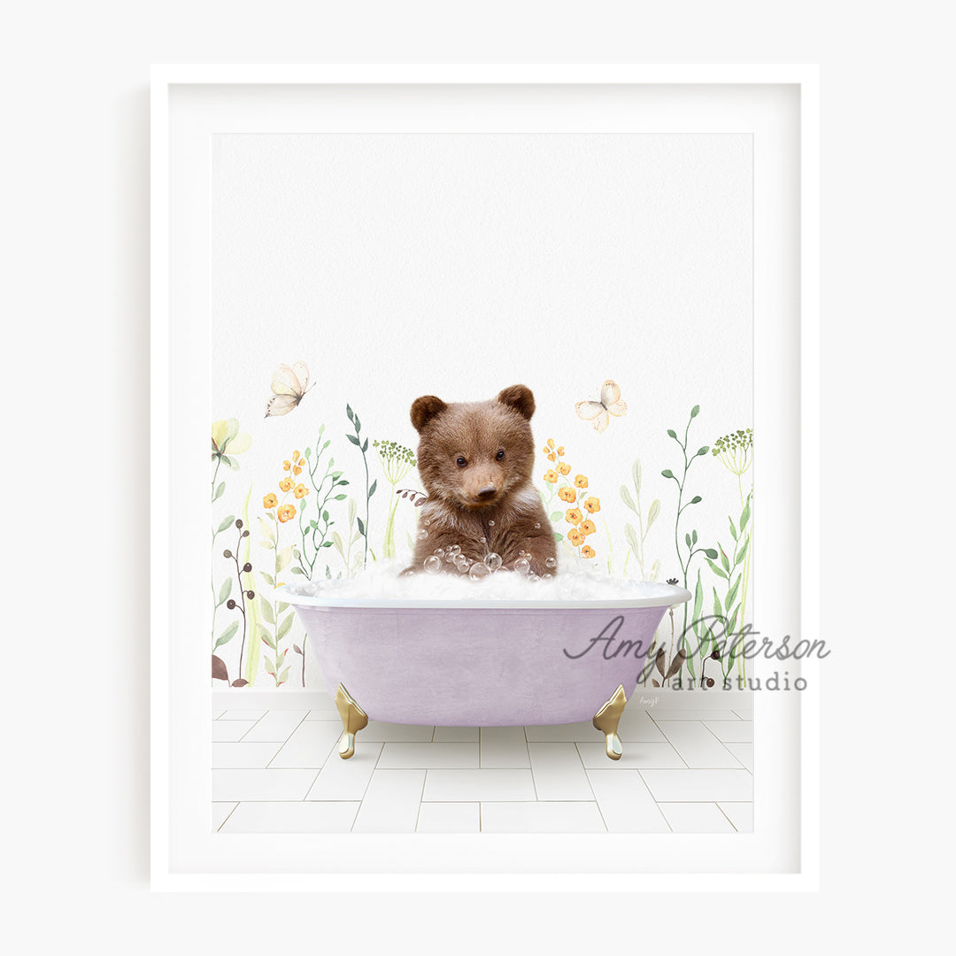 a brown teddy bear sitting in a bath tub