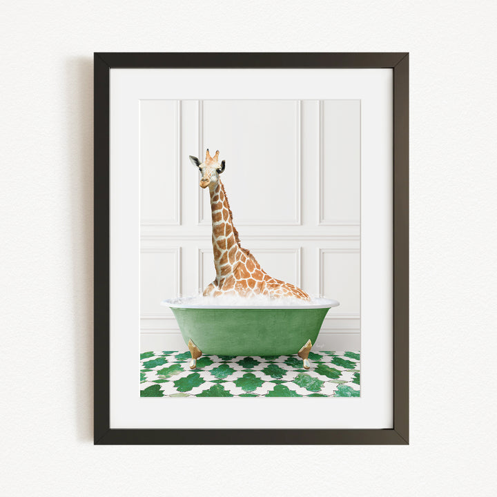 A giraffe sitting in a green bathtub filled with bubbles, surrounded by a green and white patterned rug.