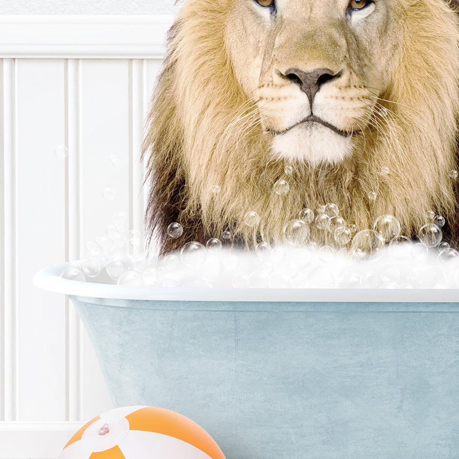 a lion sitting in a bathtub with bubbles