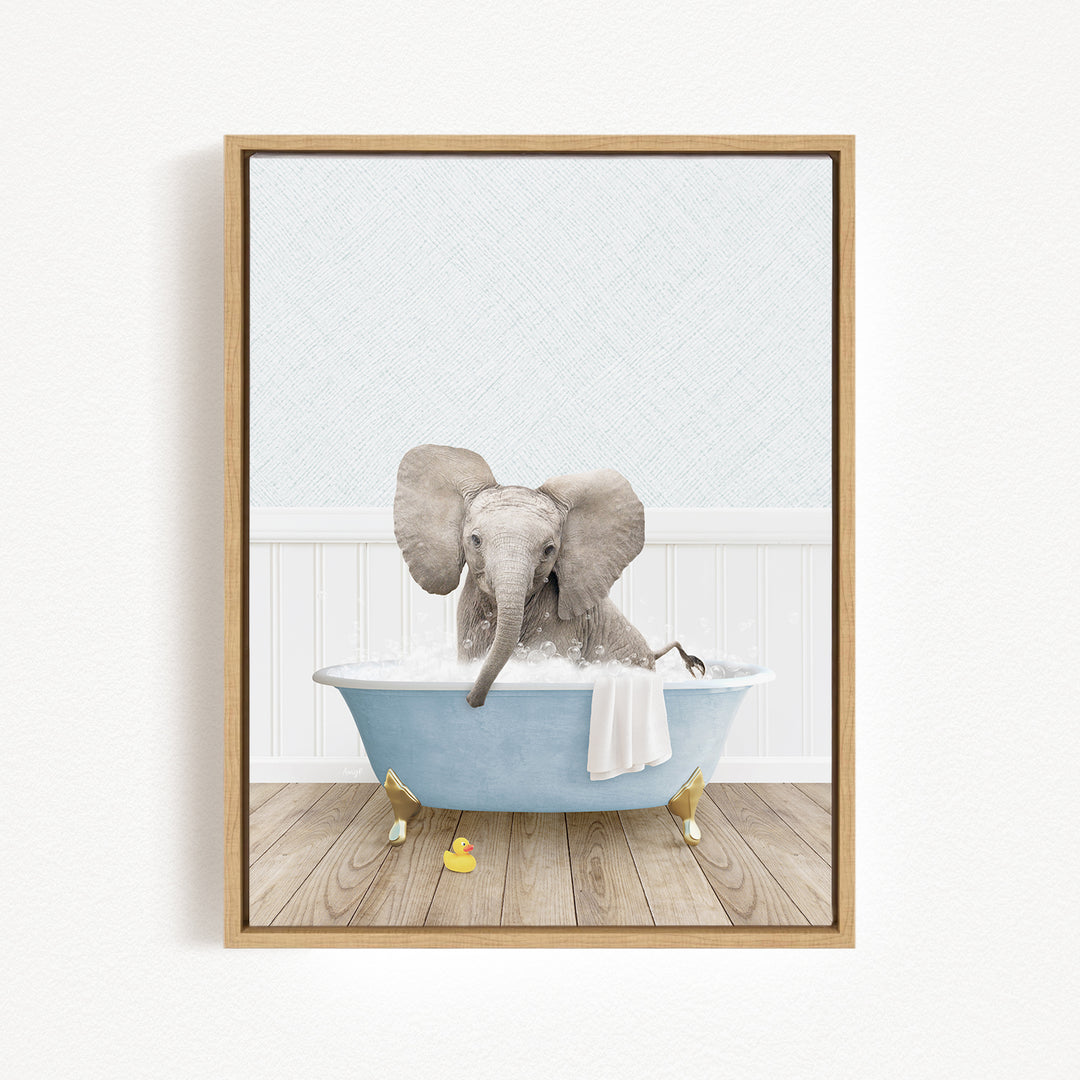 A gray elephant sitting in a blue bathtub filled with water, surrounded by a white wall and wooden floor.