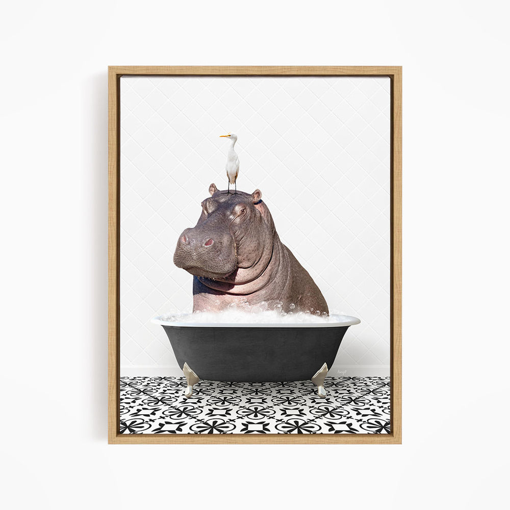 A seagull stands on the head of a hippopotamus sitting in a bathtub filled with water.