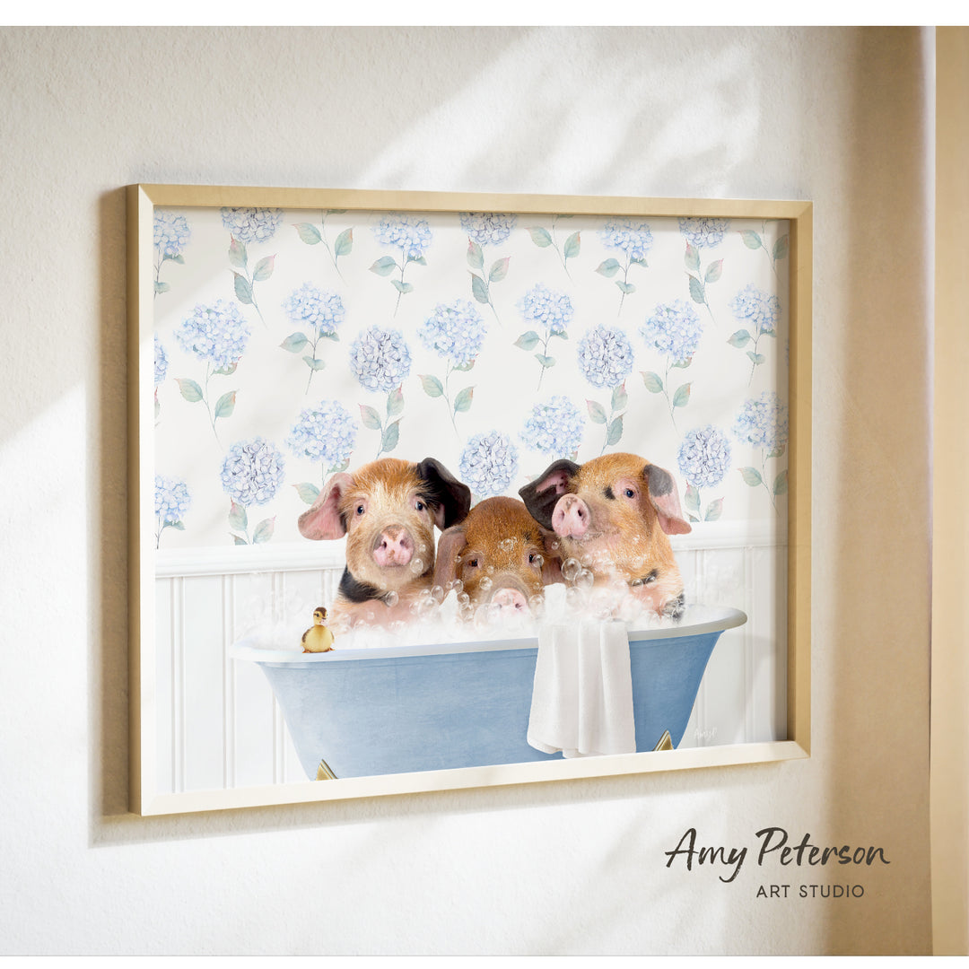Three adorable pigs sitting in a blue bathtub, enjoying a relaxing bath together.