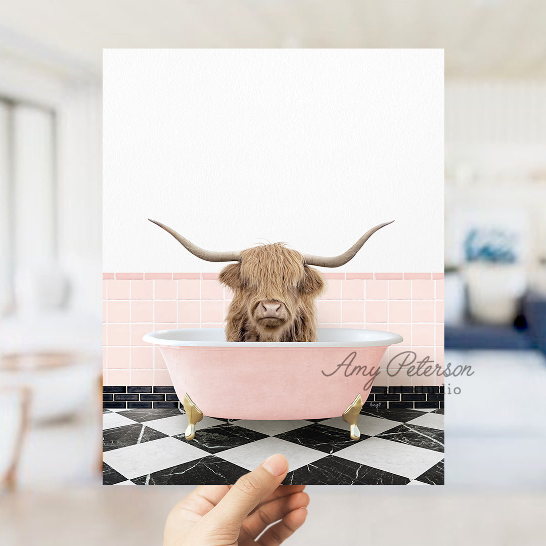 a person holding up a card with a picture of a bull in a bathtub