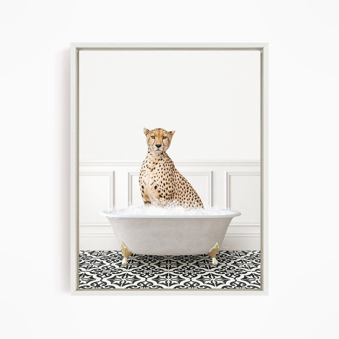 A cheetah sitting in a white bathtub filled with water, surrounded by a black and white patterned floor.