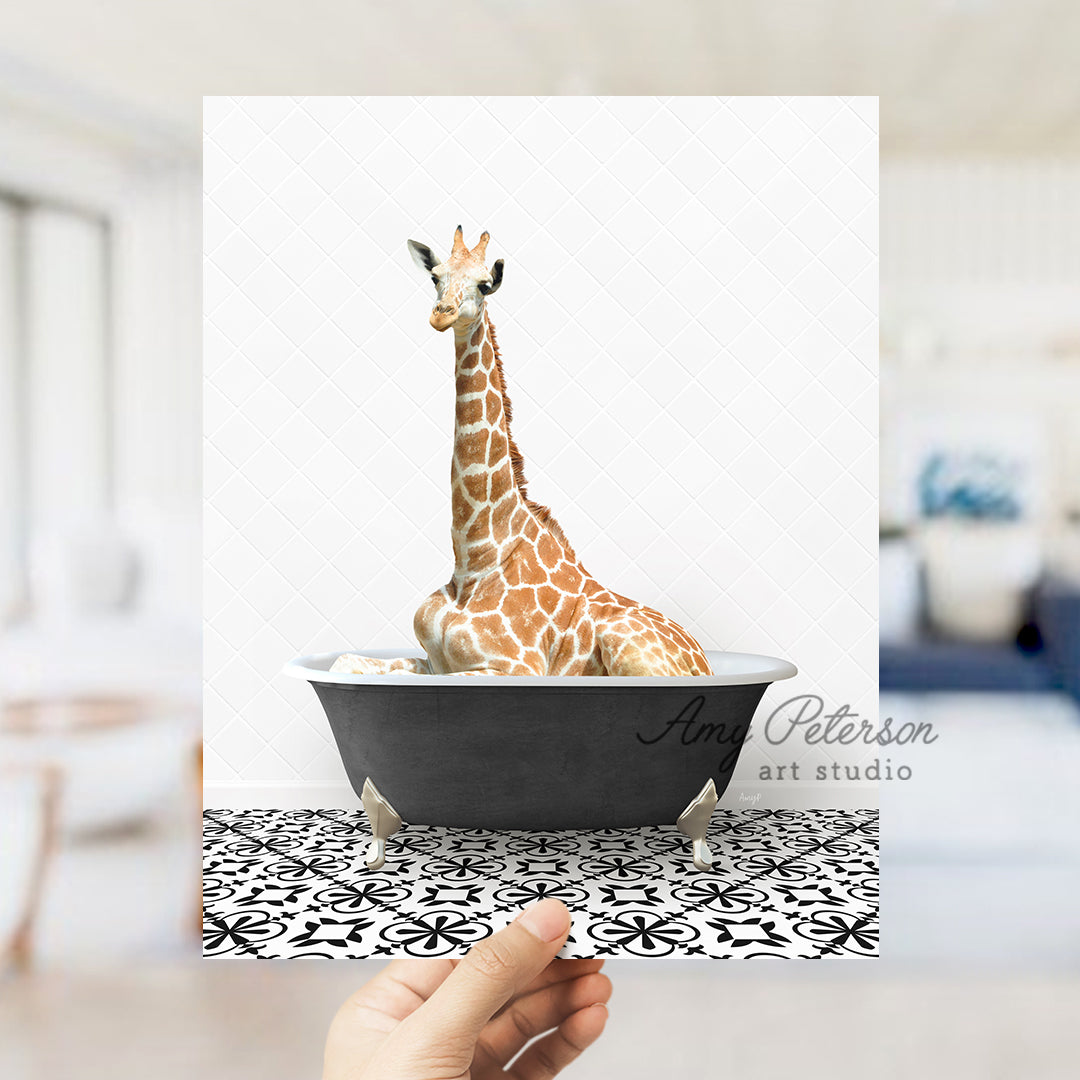 a giraffe is sitting in a bath tub