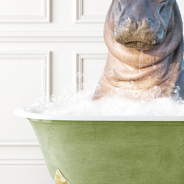 a hippopotamus sitting in a bathtub full of bubbles