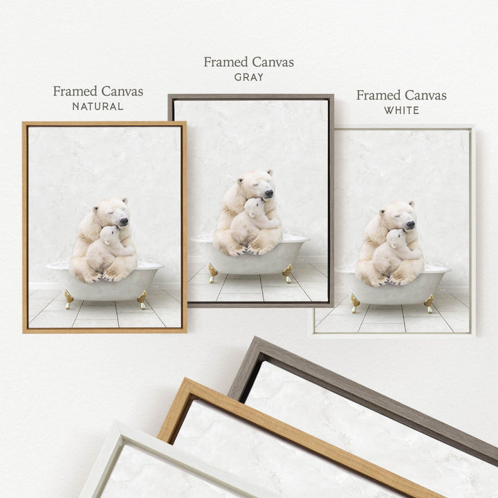three framed pictures of polar bears sitting in bathtubs, each with a different frame color: natural, gray, and white.